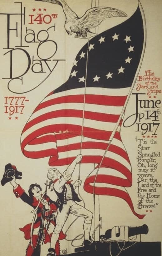 Two men depicted with a flag and text that states 140th Flag Day 1777-1917. The birthday of the Stars and Stripes. June 14, 1917 This the star spangled banner. Oh, long may it wave. Our the land of the free and the home of the brave. 